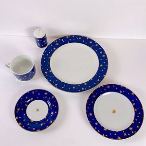 Galaxy Holiday Dinnerware set by Sakura. Fine porcelain with 14K gold accents.